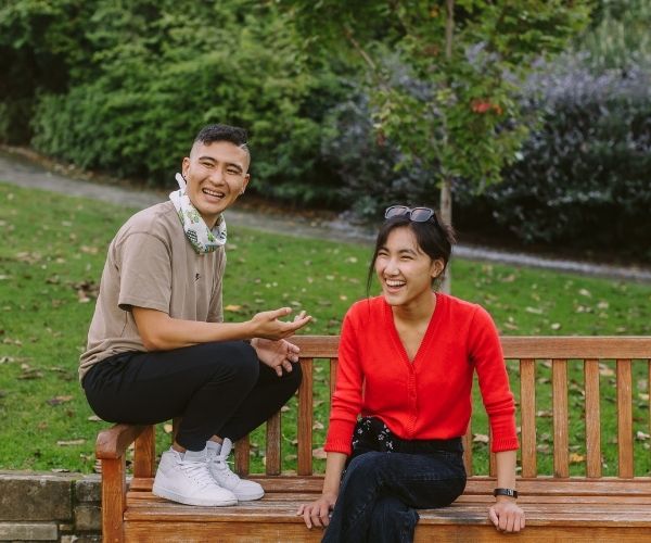 young people hanging out together in a park