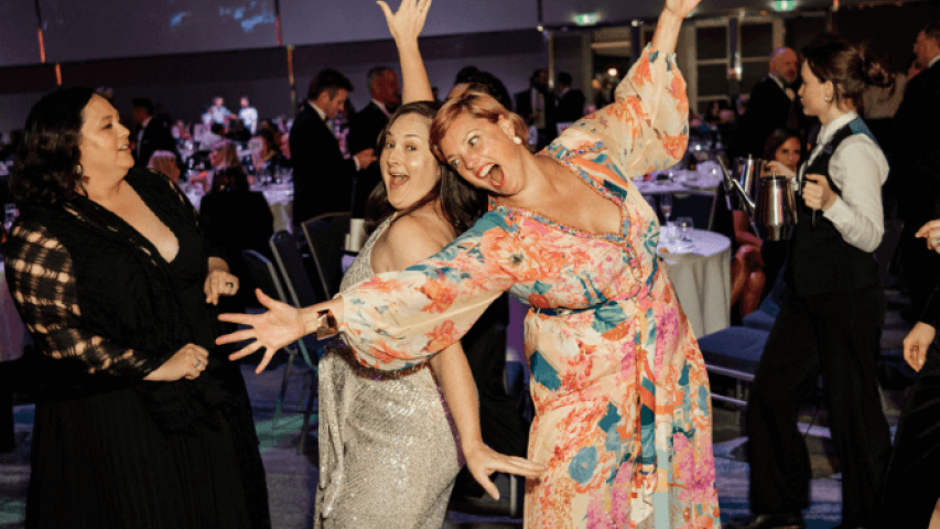 Guests at the ball dancing on the dance floor