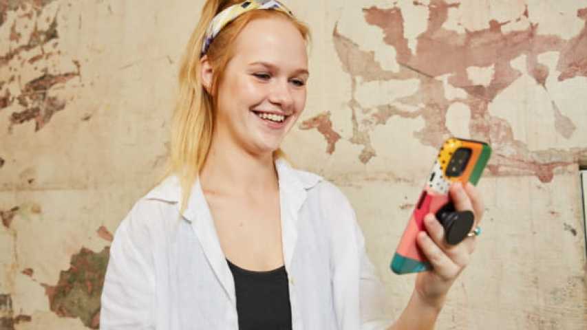 young person using their phone to access canteen connect