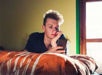 young person on his phone